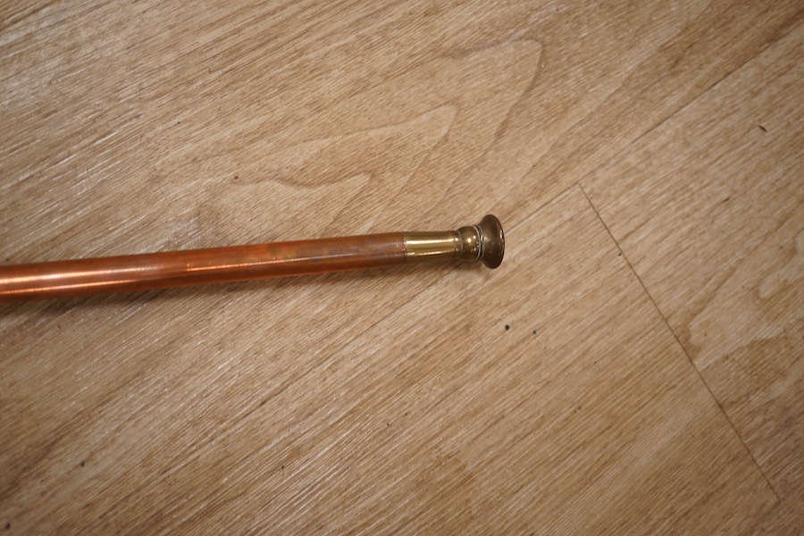 Victorian copper, including a two handled preserve pan, a copper hunting horn, a helmet coal scuttle and a warming pan. Scuttle 32cm high. Condition - hunting horn dented